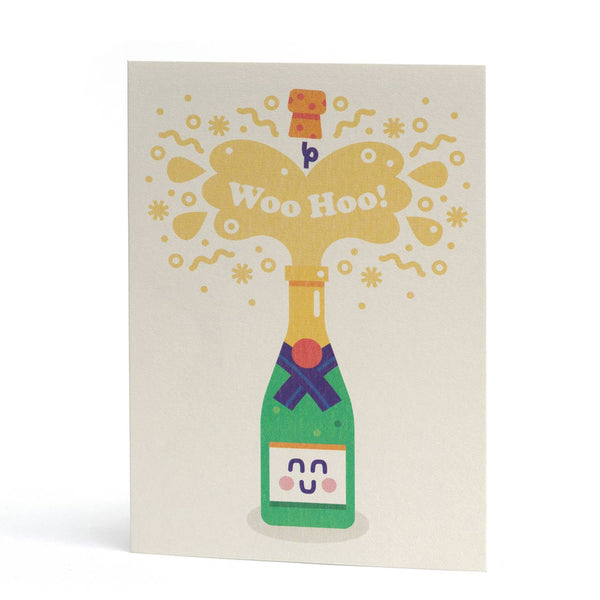 An A6 greeting card featuring a whimsical illustration of a green champagne bottle with a purple ribbon, popping open to release a gold burst of champagne and the words 'Woo Hoo!' on a white background.
