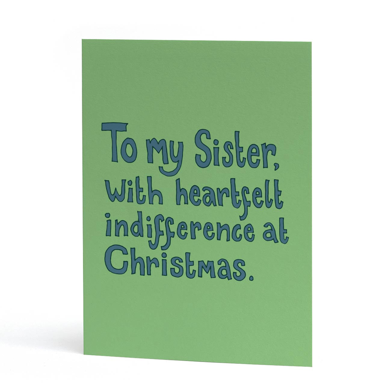 Funny, sarcastic Christmas card for Sister featuring blue hand lettering on a light green background. Text reads "To my Sister, with heartfelt indifference at Christmas."